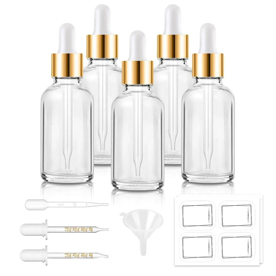 Bumobum Dropper Bottles - Clear Glass 1 oz set includes 5 leak-proof bottles with gold caps, 2 droppers, funnel, pipette, and 8 labels for oils and serums.