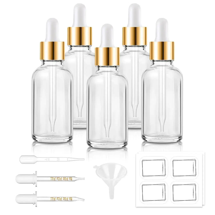 Bumobum Dropper Bottles - Clear Glass 1 oz set includes 5 leak-proof bottles with gold caps, 2 droppers, funnel, pipette, and 8 labels for oils and serums.